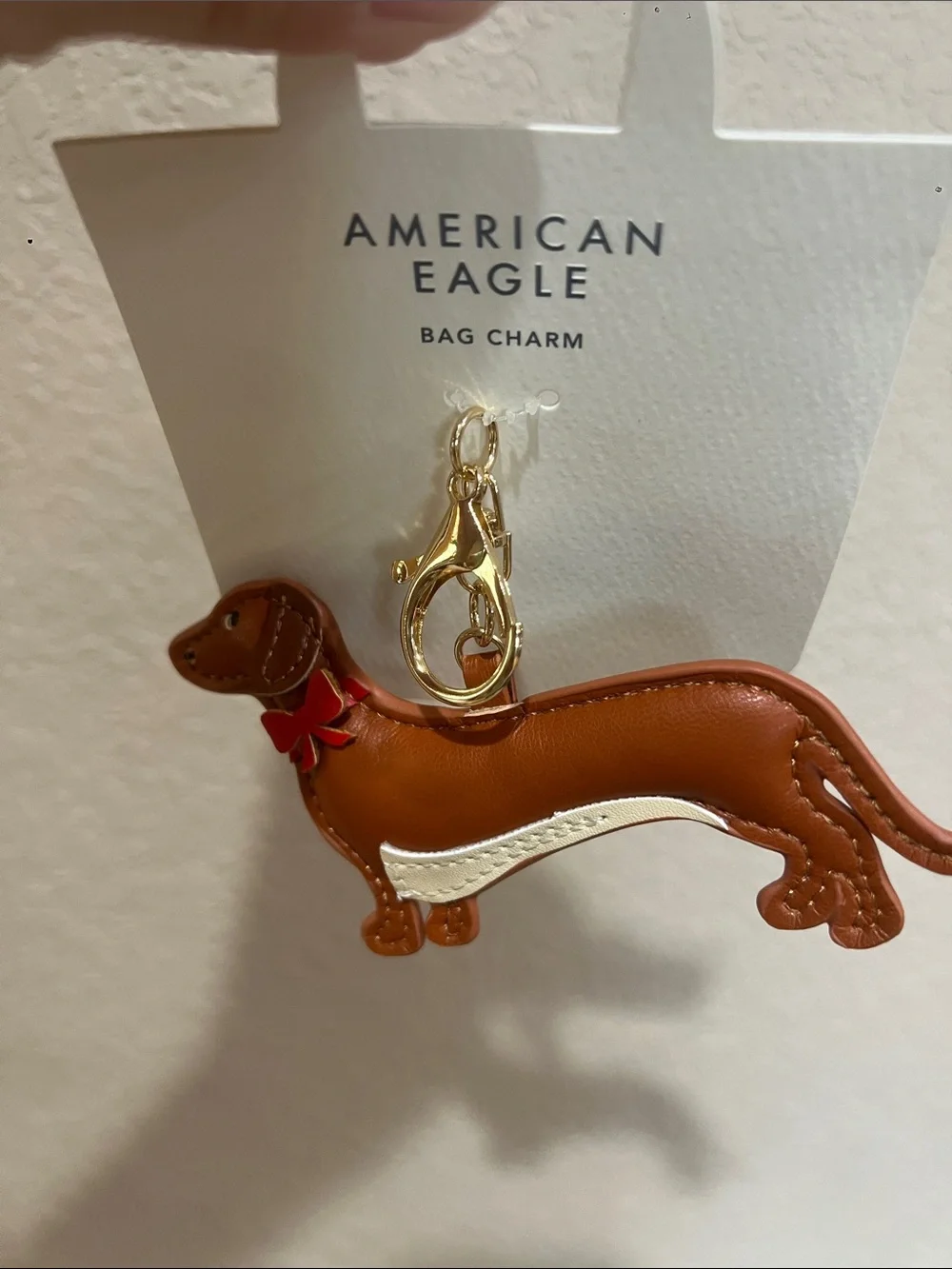 American Eagle Outfitters Brown & Cream Dachshund Bag Charm with Red Bow